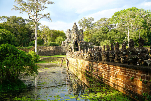 Approaching the gate, visitors are greeted by an awe-inspiring bridge spanning the moat