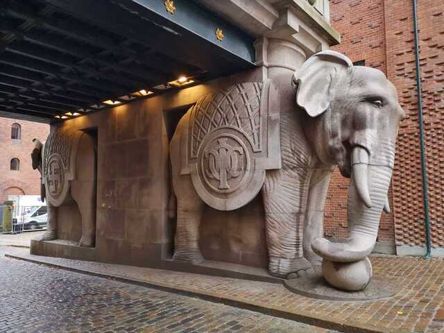 Built from granite sourced from Bornholm Island, the structure features four colossal elephants, each carrying a tower-like structure on its back