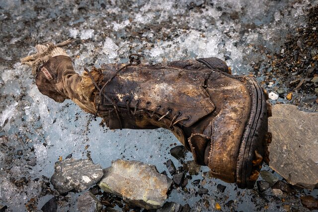 Close-up of Irvine’s preserved boot, showcasing the durable yet worn craftsmanship of early 20th-century mountaineering gear.