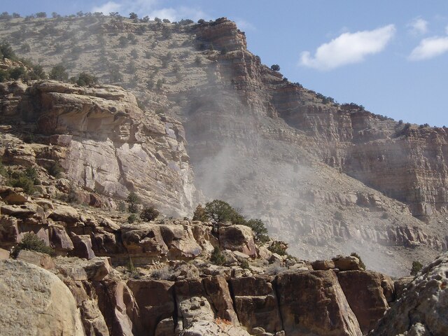 Clouds of road dust rising through the canyon, a stark reminder of environmental impact, March 2008.