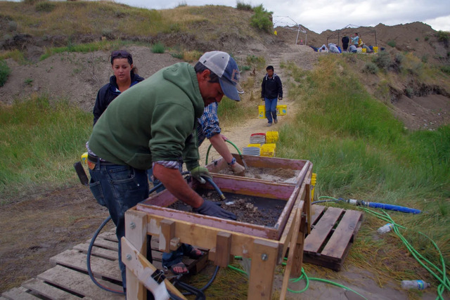 Co-principal investigator Todd Surovell uses water screening at La Prele to uncover tiny artifacts, such as delicate bone needles, hidden in sediment.