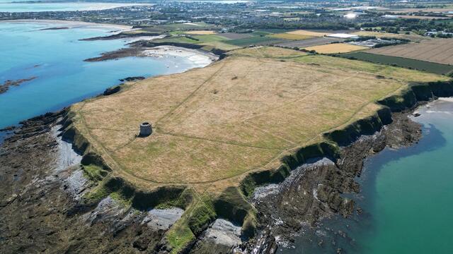 Drumanagh, a 46-acre promontory fort overlooking the Irish Sea, stands as a monumental site of archaeological and historical importance.