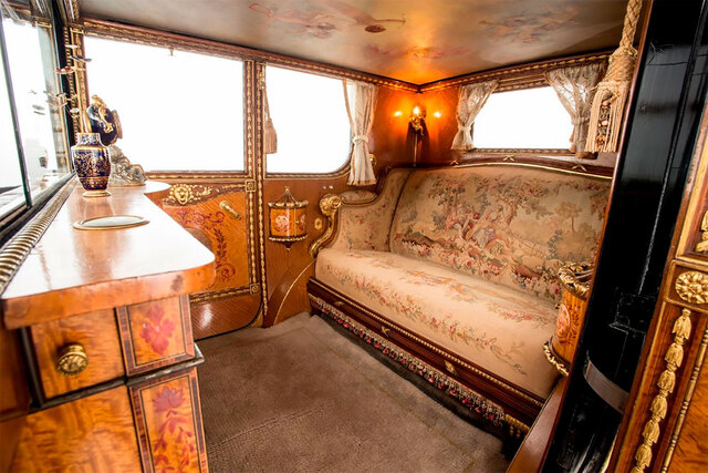 Elegant seating in the rear cabin, showcasing the impeccable craftsmanship of this historic masterpiece.