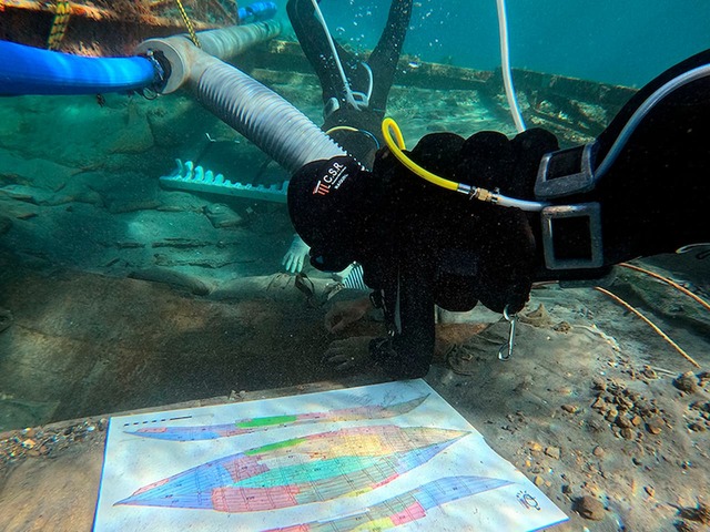 Experts using advanced mapping techniques to document the precise layout of the ancient shipwreck.