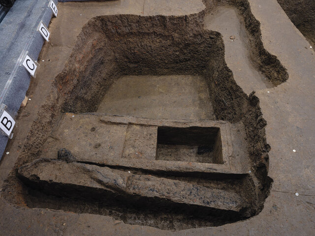 From Pit 5, a partial one-foot-wide gold mask weighing half a pound, and from Pit 3, an intact gold mask measuring 1.2 feet wide and weighing 0.2 pounds, share the distinctive bulging eyes seen on Sanxingdui's bronze masks.