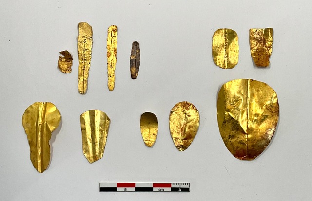 Gold tongues and nails discovered in the Ptolemaic tombs of Oxyrhynchus, carefully preserved as offerings to enhance speech and gestures for divine acceptance in the afterlife.