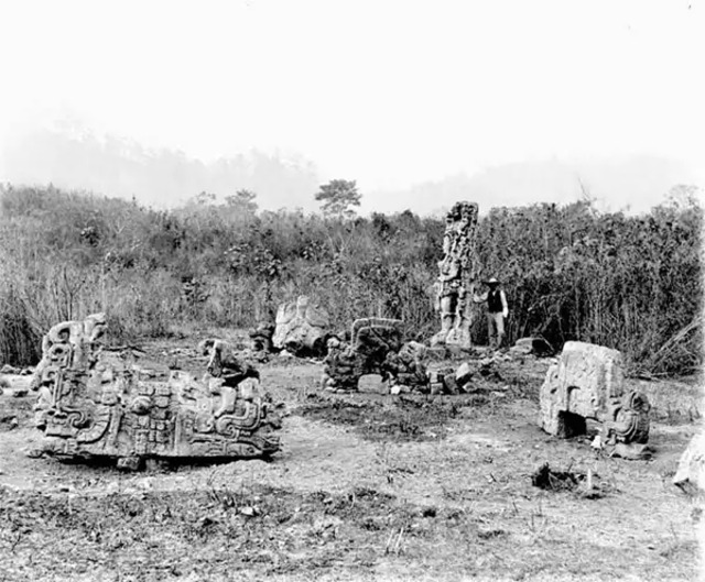 Monuments scattered across the ancient Maya site of Copán in modern-day Honduras, standing as relics of a bygone era.