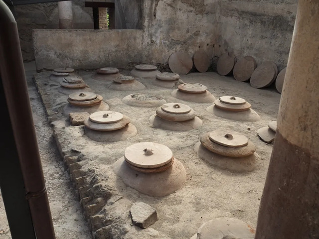 Partially Buried Dolia at a Wine Cellar in Boscoreale, Italy, Demonstrate the Romans’ Practical and Aesthetic Approach to Storing Wine.