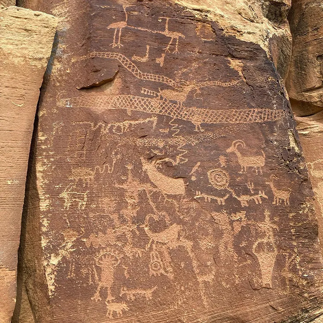 Petroglyphs and pictographs adorning the canyon walls