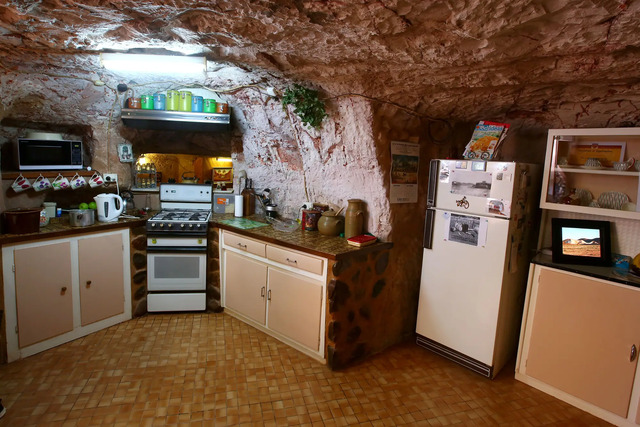 Residents have transformed old opal mines into underground homes to escape Coober Pedy's sweltering heat.