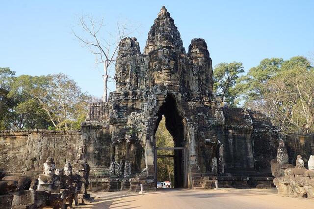 The South Gate of Angkor Thom, the most well-preserved and iconic of the five gates, rises nearly 23 feet high