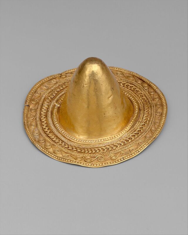 The conical boss from a bowl, likely a ceremonial piece, reflects the sacred and decorative uses of gold in daily life and rituals.