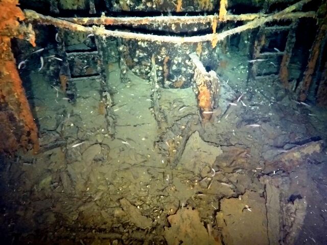 The conning tower, where commanding officers once stood, remains partially intact, offering a glimpse into the submarine’s operational layout.