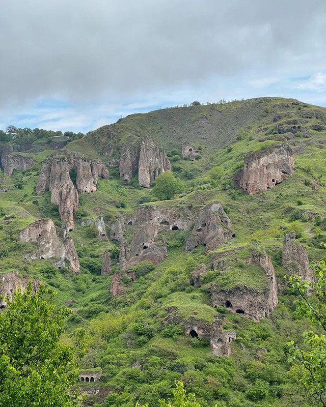 The dramatic cliffs of Khndzoresk, where ancient architecture and natural beauty create a mesmerizing tapestry.