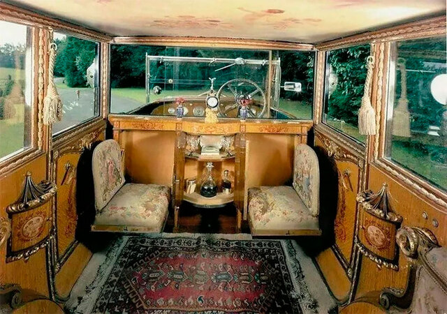 The driver's cabin of the 1926 Rolls Royce, a blend of classic luxury and timeless design.