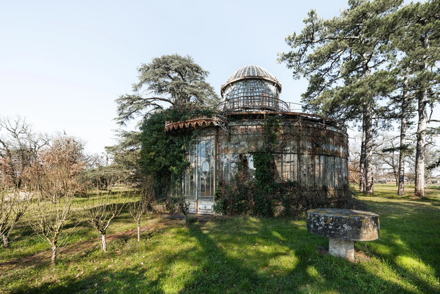 The greenhouse stands as a hidden gem of the French countryside, offering a rare glimpse into a bygone era while sparking curiosity about its past