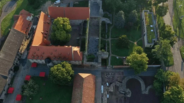 The historic Memleben Monastery: A glimpse into the past, with the monastery garden on the right, concealing the predecessor of the grand monumental church beneath its borders.