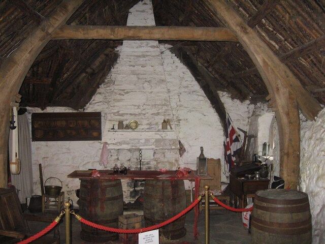 The interior of the cottage, rich in historical artifacts, offering a look back in time.