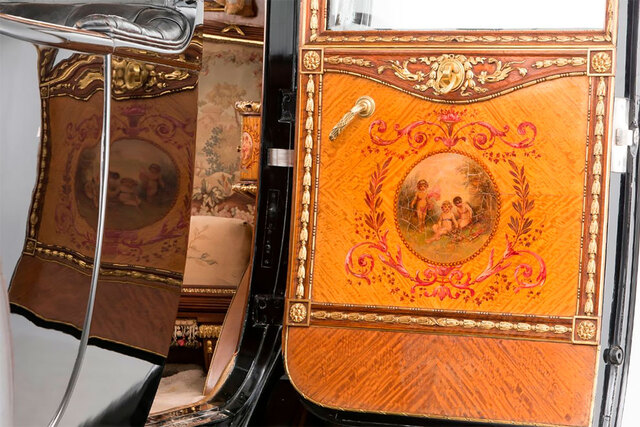 The intricately painted door panel, combining luxury and artistry in the 1926 Rolls Royce design.