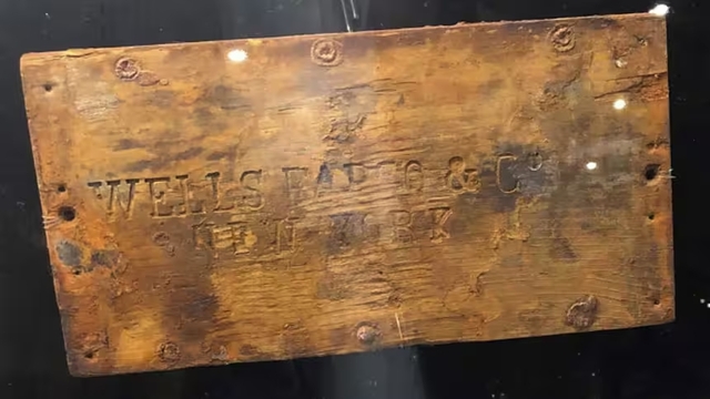 The lid of a Wells Fargo & Co. treasure box is among hundreds of remarkable artifacts, including a pair of jeans, recovered from the shipwreck of the S.S. Central America.