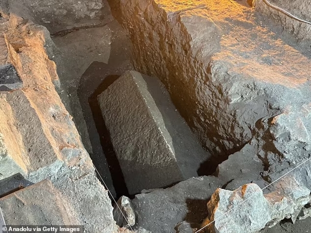 The partially excavated sarcophagus believed to house Saint Nicholas, discovered beneath layers of church flooring.