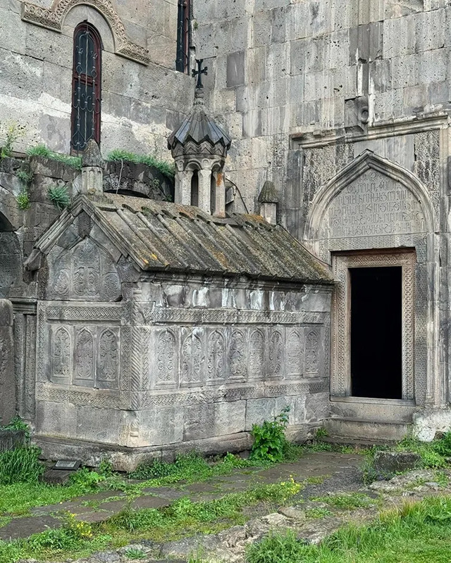 The resting place of the past: an intricate tomb in Old Khndzoresk, echoing the artistry of Armenian stone craftsmanship.