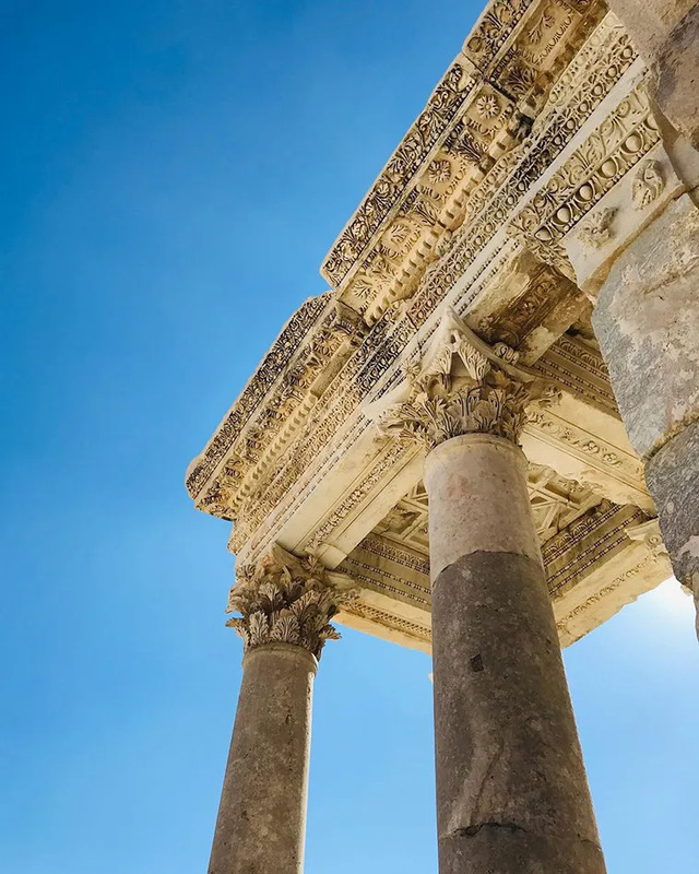 The sprawling ruins of Sagalassos, set against a dramatic mountain landscape, reflecting its strategic and scenic location.