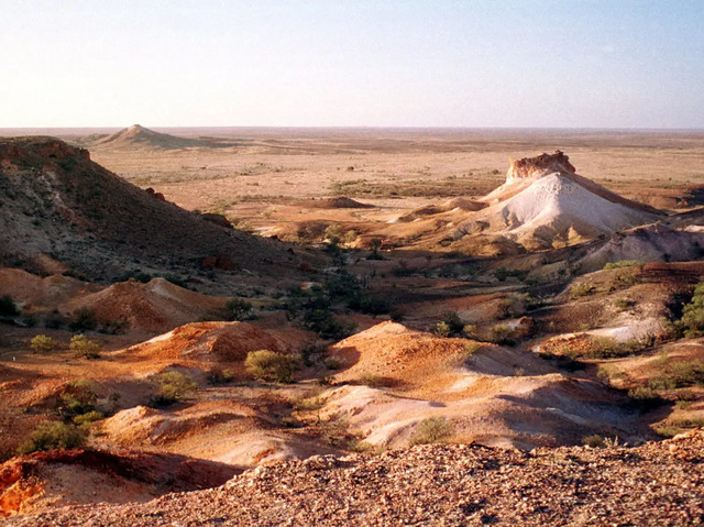 The stark, barren landscape surrounds the unique opal mining town of Coober Pedy.