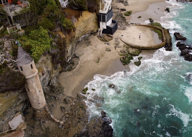 The tower and its circular beach-side pool remain, offering a glimpse into its historical functionality.