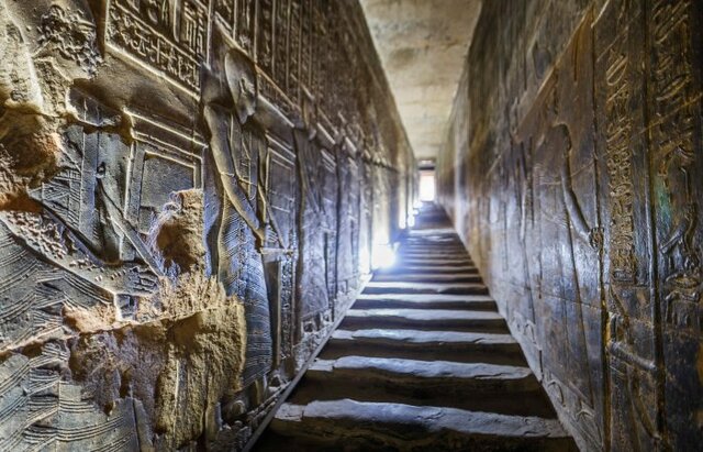 The western staircase of the Temple of Hathor, adorned with intricate depictions of the pharaoh, his priests, and the goddess, leads to the temple’s roof.