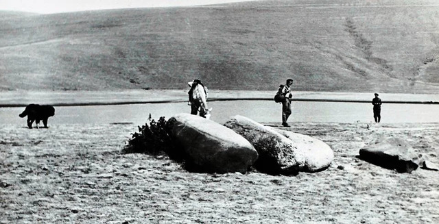 This 1970s photograph shows the stones lying horizontally in their natural state. Of the four remarkable dragon-stones, two were later transported to Yerevan and are now proudly displayed in Tigran Mets Park.