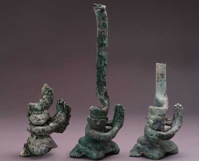 Unique bronze statues, possibly depicting ancient warriors or ritual figures, stand as silent witnesses to the kingdom's lost rituals.