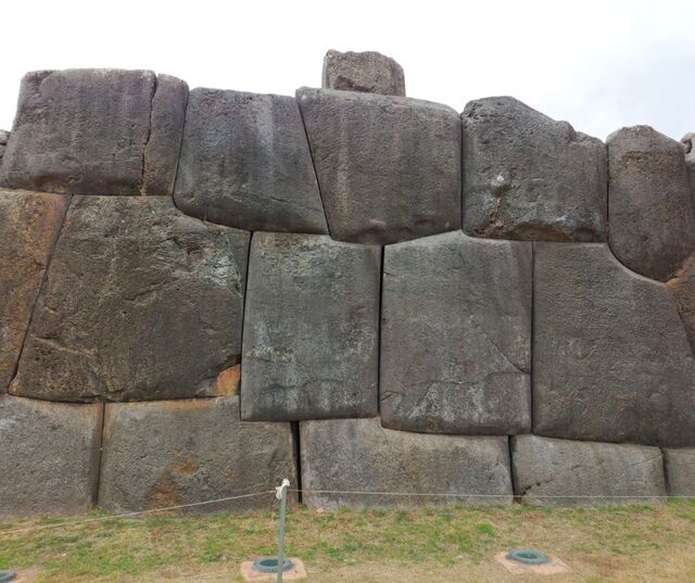 Workers quarried, transported, and meticulously placed massive limestone blocks, some weighing over 200 tons