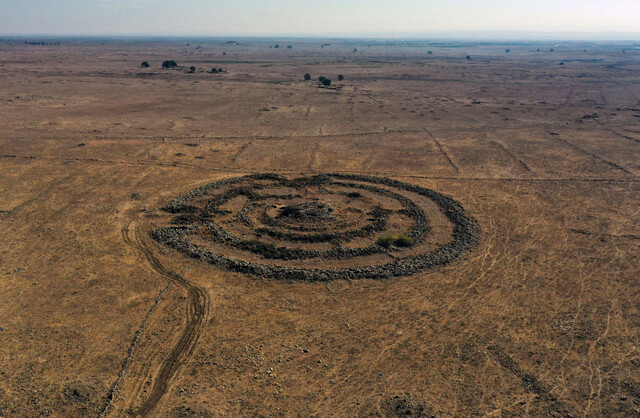 This extraordinary Early Bronze Age II site, Rujm el-Hiri, situated near Yonatan in the Golan Heights, comprises more than 42,000 basalt stones forming a massive 160-meter-wide, 2.4-meter-tall structure. (Credit: Menahem Kahana/AFP via Getty Images, November 10, 2021)