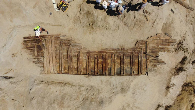 A detailed overhead shot of the nearly 42-foot-long Roman vessel’s timber framework, showcasing its remarkable preservation despite being buried for centuries. (Credit: Institute of Archaeology, Belgrade)