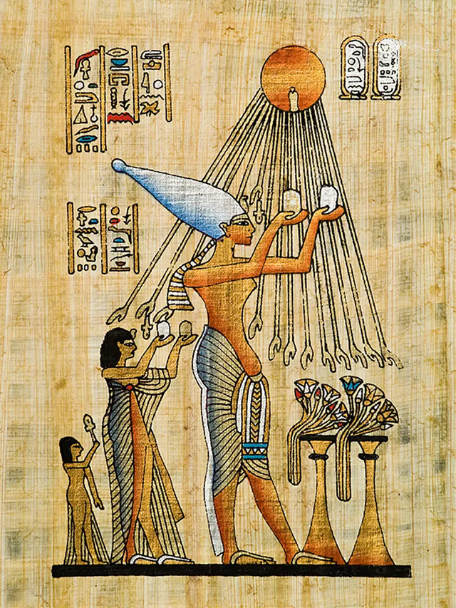 A Sacred Offering: Akhenaten, Nefertiti, and their daughter Meritaton presenting water offerings to Aten. (Image source: iStock)