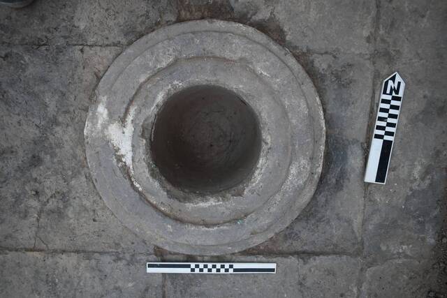 A beautifully crafted stone bowl uncovered in the floor of an ancient shrine at Nimrud, offering clues to ancient rituals.