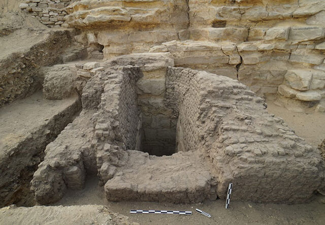 A close-up of a mudbrick mastaba structure discovered at Saqqara, featuring a sealed limestone burial shaft leading to the chamber below. Credit: Ministry of Tourism and Antiquities of Egypt.