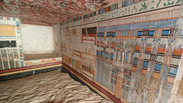 A close-up of the vibrant wall paintings within the tomb, depicting symbolic inscriptions and geometric patterns. (Courtesy: Egyptian Ministry of Tourism and Antiquities)