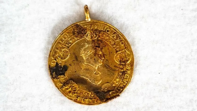 A gold medallion, believed to be part of the burial regalia of a medieval Lithuanian-Polish ruler, showcases the craftsmanship of a bygone era.