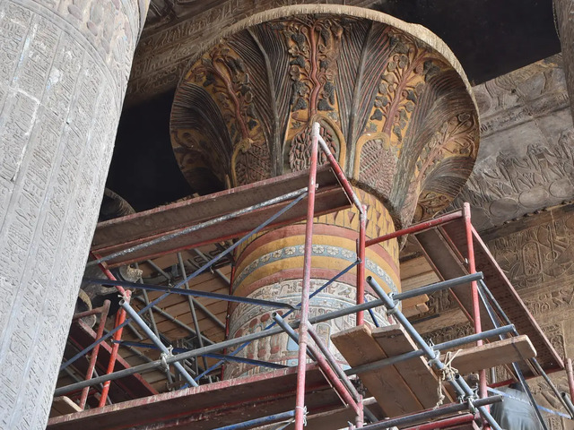 A majestic column in the Temple of Esna undergoes careful restoration to preserve its historical beauty. (Ahmed Amin)