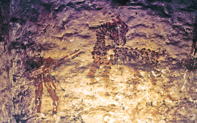 A photograph from 1973 preserves the memory of a now-lost mural from a house in Chajul, depicting a hunter aiming at a large animal.