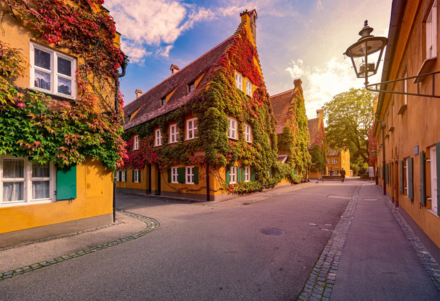 A picturesque view of the historic apartments in Fuggerei, blending charm and heritage.