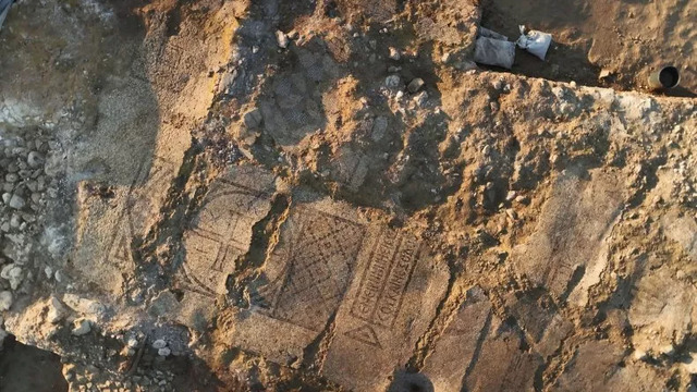 A section of the Byzantine monastery's mosaic floor showcases intricate designs, including crosses, lions, doves, and other symbolic imagery. (Emil Aljem/Israel Antiquities Authority)