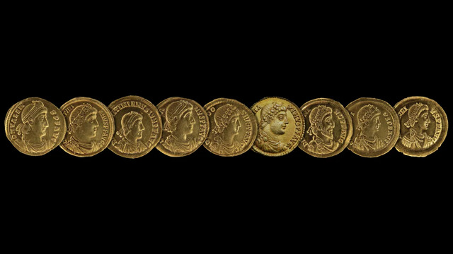 A selection of 1,700-year-old gold coins, adorned with portraits of eight Roman emperors and the usurper Eugenius, offers a captivating glimpse into Roman history. (Image credit: C. Nosbusch/INRA)