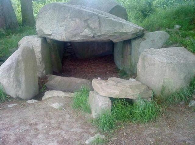 A striking example of a Funnel Beaker Culture dolmen, a single-chamber megalithic tomb, located in Lancken-Granitz, Germany.