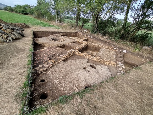 Aerial view of the excavation site at Lucus Asturum, revealing the layout of Roman-era buildings and infrastructure in the region.