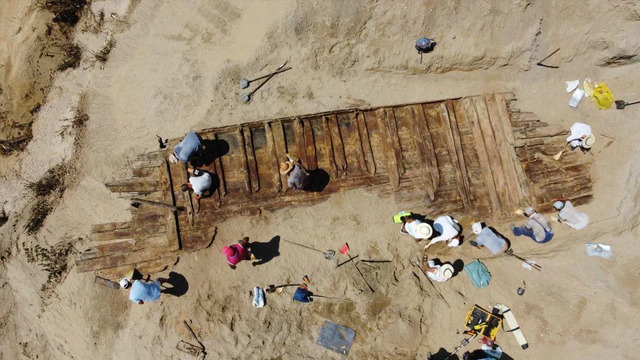 An aerial view of archaeologists meticulously excavating the remains of the ancient Roman ship discovered near the Drmno mine, Serbia. (Credit: Institute of Archaeology, Belgrade)