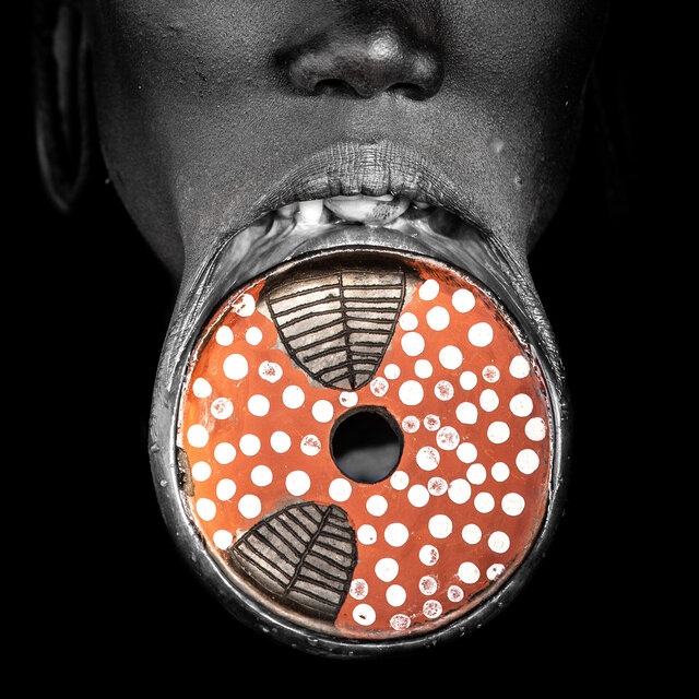 An intricately decorated Mursi lip plate highlights the artistry and significance of this ancient tradition. (Credit: Jayne Mclean) 