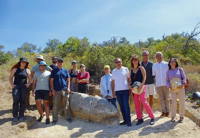 Archaeological team celebrating the discovery of the Neolithic menhir in Monte do Trigo.